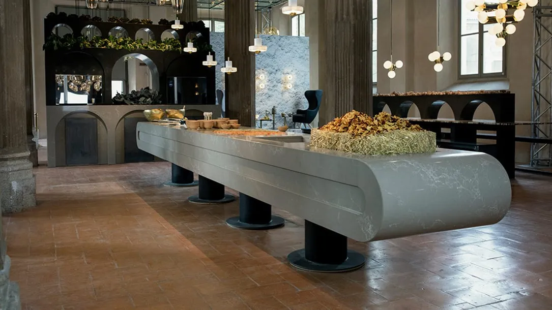 Modern interior with a Caesarstone gray quartz table in a contemporary dining space as a model of the thermoforming process